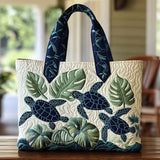Sac cabas artisanal matelassé blanc, motif tortues de mer bleu et feuilles vertes