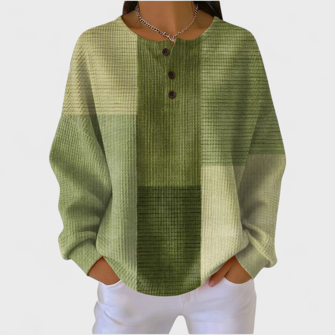 Haut tunique vert ample, col rond boutonné et manches longues, tissu texturé