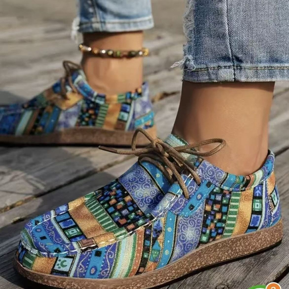 Mocassins à motifs bleus, lacets en cuir et semelle marron
