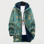 Manteau à capuche vert motif floral, capuche doublée bleu marine, fermeture zippée