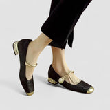 Ballerines bébés satinées noires à talon bijou, bride nouée et bout rond