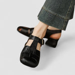 Sandales bébé noires à talon bas, bout ouvert, bride et boucle réglable