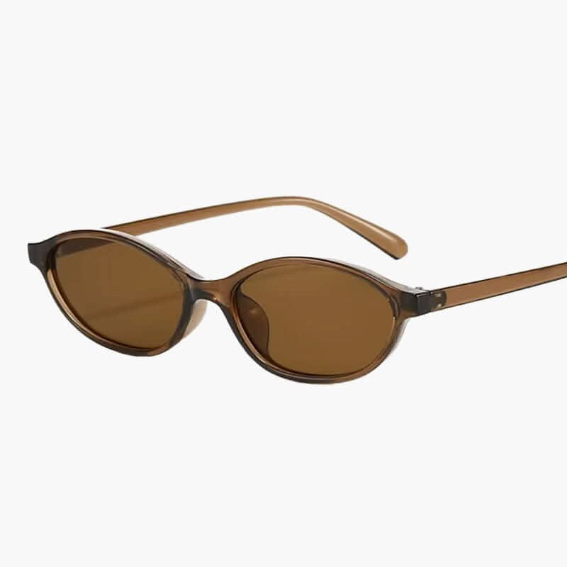 Lunettes de soleil marron à monture dorée et verres bruns teintés ovales.