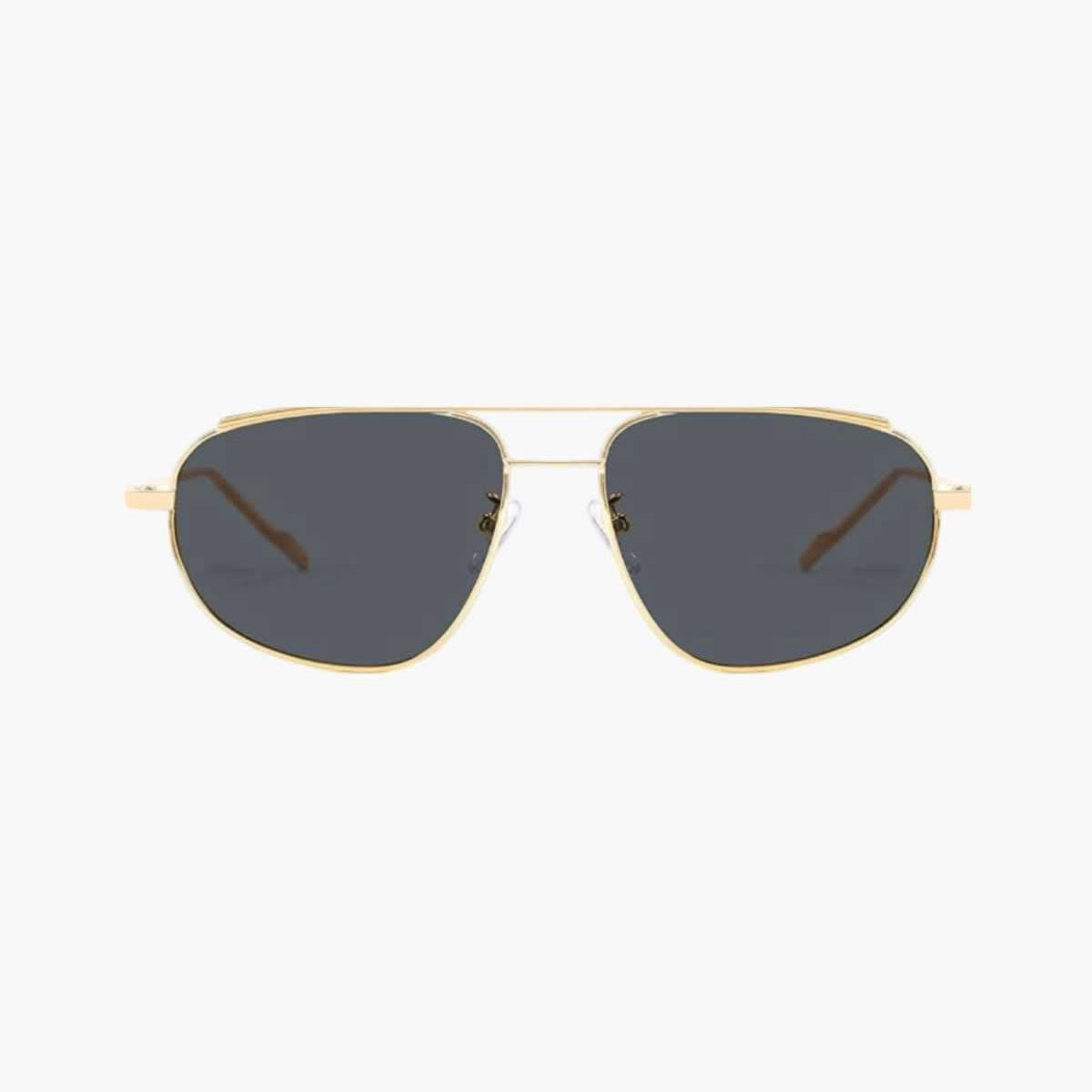 Lunettes de soleil monture dorée, verres foncés et branches fines