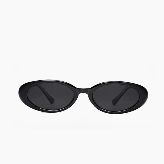 Lunettes de soleil Kaelani noires, vue de face, verres ovales fumés.