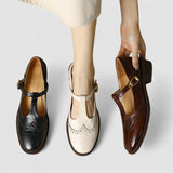Salomés perforées à boucles : noir, beige et marron, talon moyen
