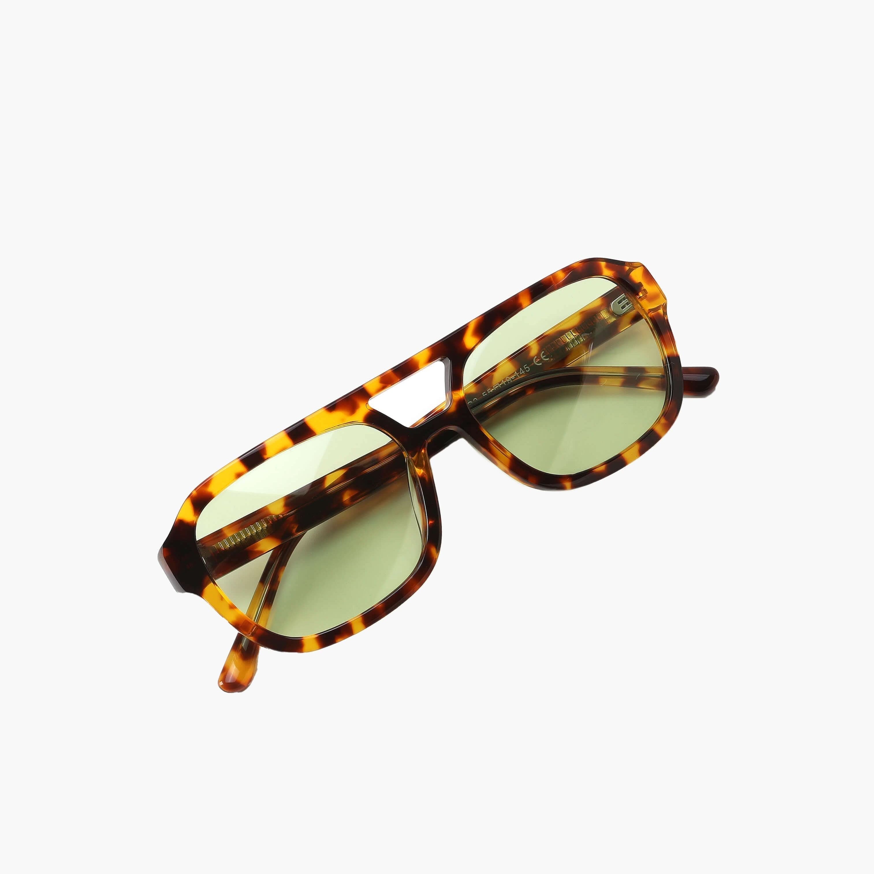 Lunettes de soleil Jaslynn à monture écaille, verres ambrés teintés verts