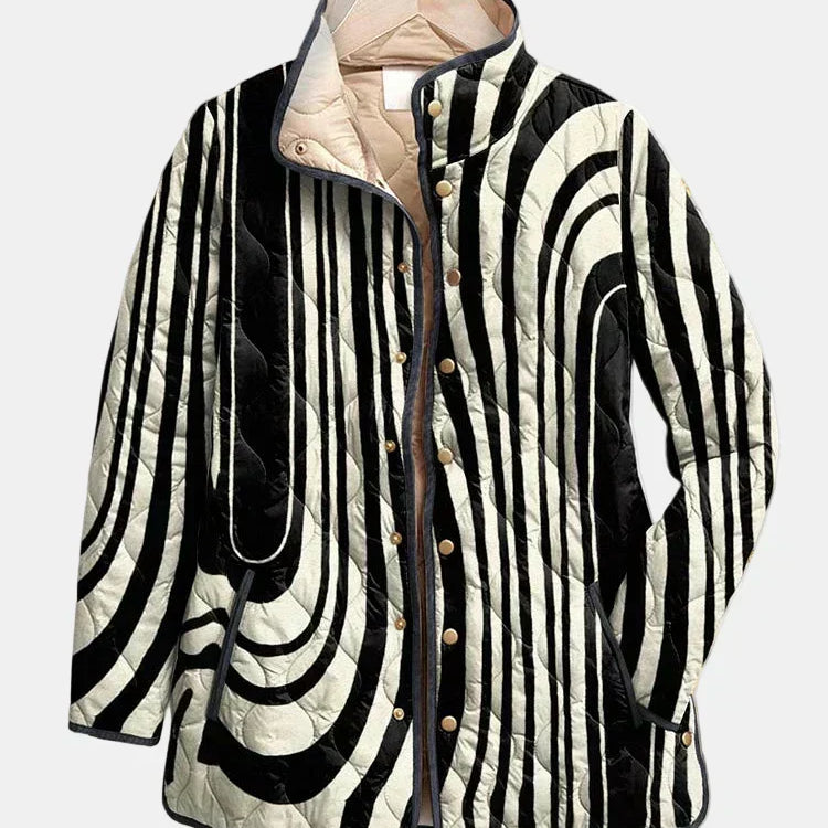 Veste matelassée boutonnée noir et blanc à motif géométrique, col simple, doublure beige