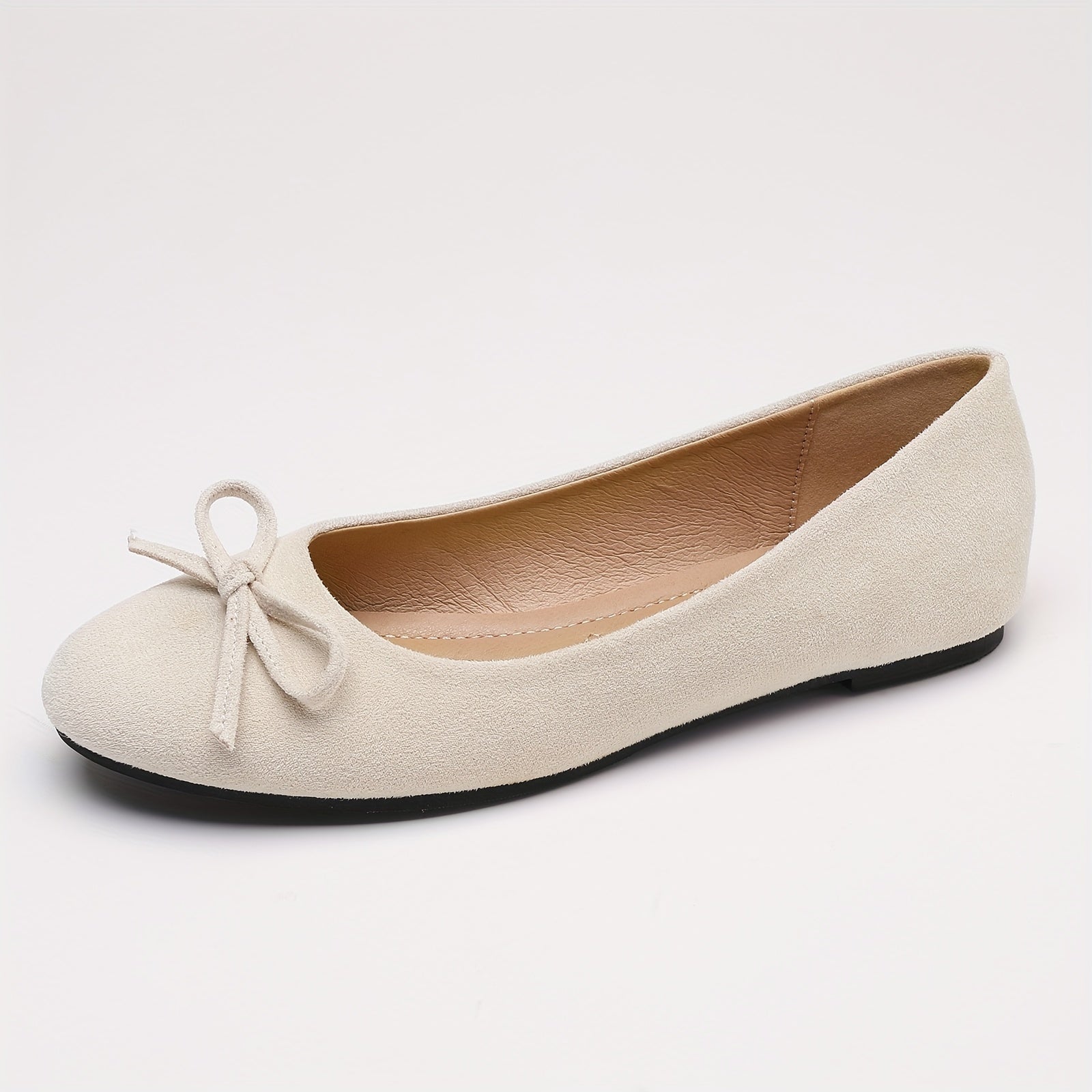 Ballerines souples beige clair, bout rond à nœud, semelle noire