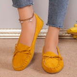 Mocassins Flavie moutarde à nœud, bout rond et coutures contrastées