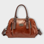 Sac à bandoulière vintage en cuir marron, fermeture zippée et anses rigides