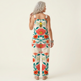 Combinaison pantalon sans manches dos échancré, motifs floraux et lanières larges.