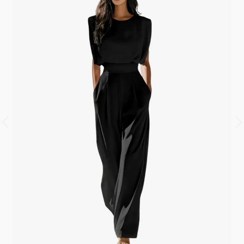 Combinaison noire sans manches avec ceinture ajustable, pantalon long ample.