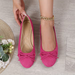 Ballerines souples roses fuchsia en daim, nœud sur l’avant et intérieur beige