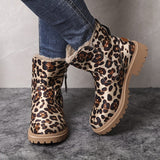 Bottines d’hiver femme léopard, doublure fausse fourrure et fermeture zippée sur le côté.