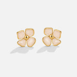 Élise – Boucles d’oreilles rondes avec motif floral.