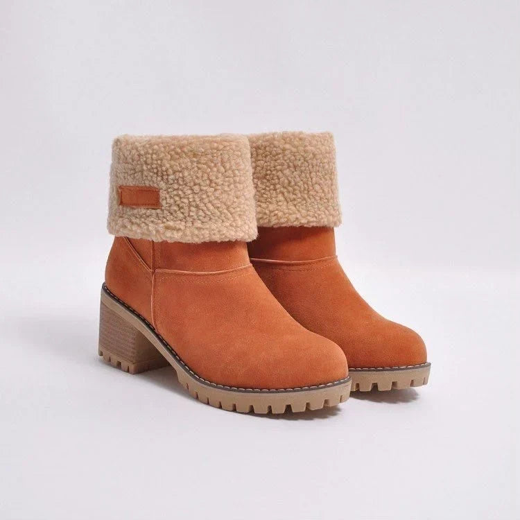 Bottes daim orange fourrées sherpa, bord beige, talon carré et semelle crantée
