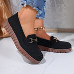 Mocassins noirs à boucle métal, dessus en textile et semelle crantée