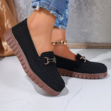 Mocassins noirs à boucle métal, dessus en textile et semelle crantée