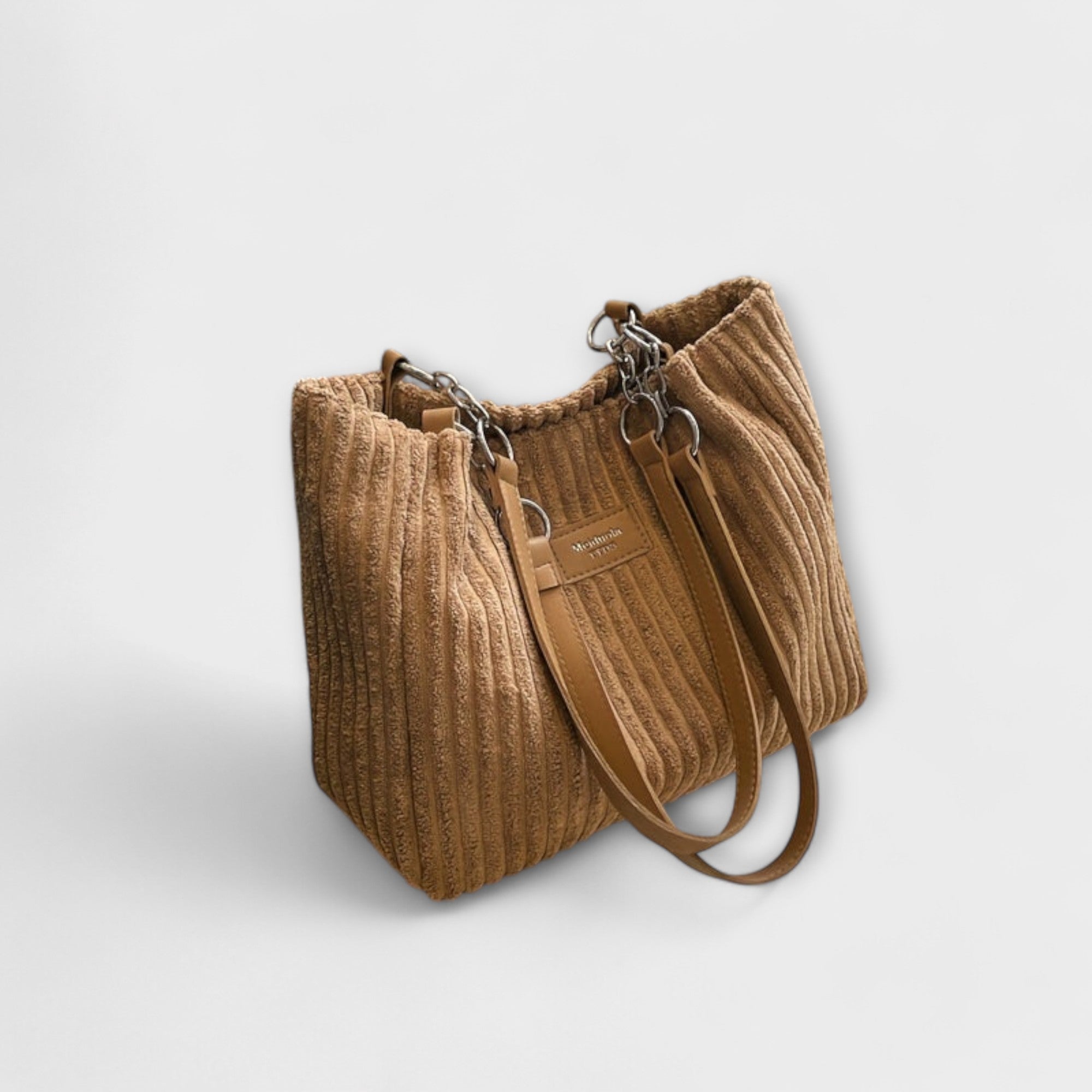 Sac à bandoulière en cordon doux beige, anses courtes et bandoulière amovible.