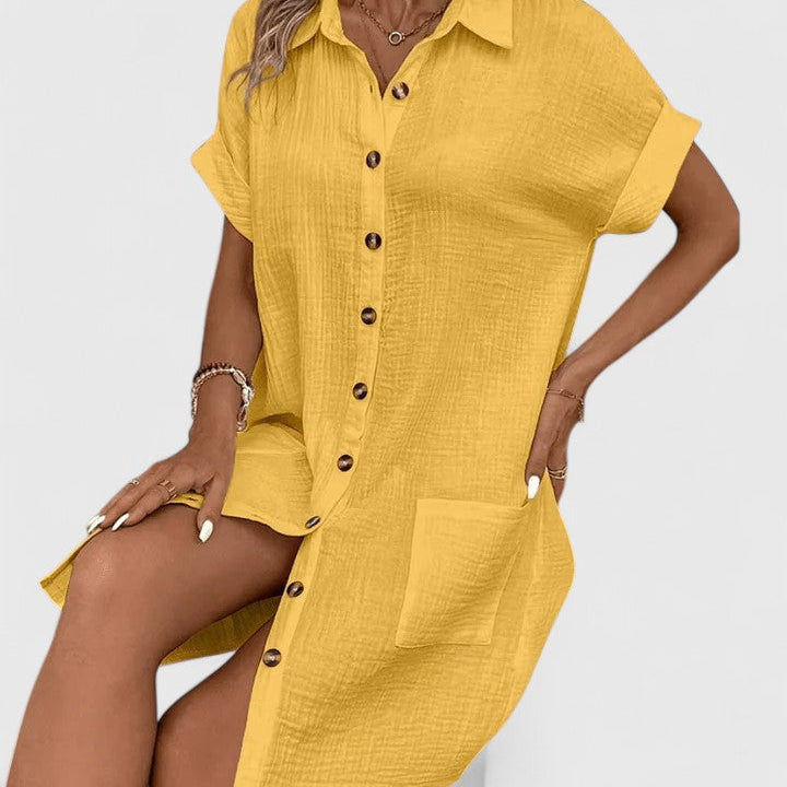 Robe midi jaune en tissu léger, manches courtes, patte boutonnée et poche poitrine