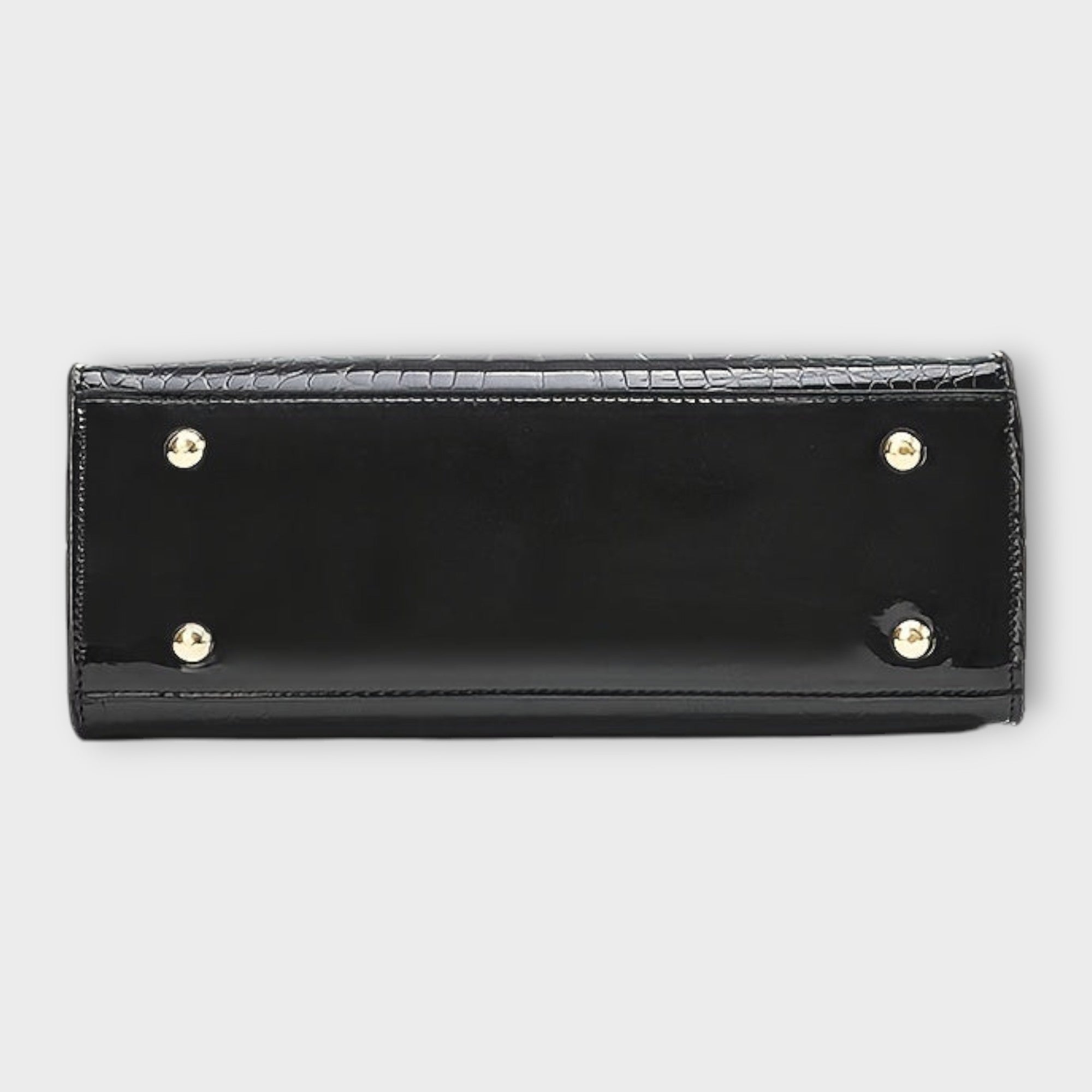 Dessous de sac à main en cuir effet crocodile brillant noir, avec pieds et boutons métalliques