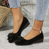 Ballerines suédées noires à nœud, talon compensé bas, vue latérale