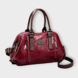 Sac à bandoulière vintage en cuir rouge, anses rigides et bandoulière assortie