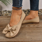 Ballerines à bout arrondi beige à nœud, vue du dessus et du talon
