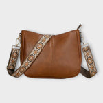 Sac bandoulière vegan marron, fermeture zippée et bandoulière à motif décoratif.