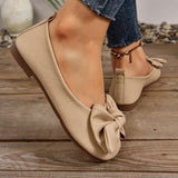 Ballerines à bout arrondi beige en texture, nœud sur le dessus, talon plat