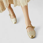 Chaussures bébé dorées en satin, bride à nœud et talon bijou