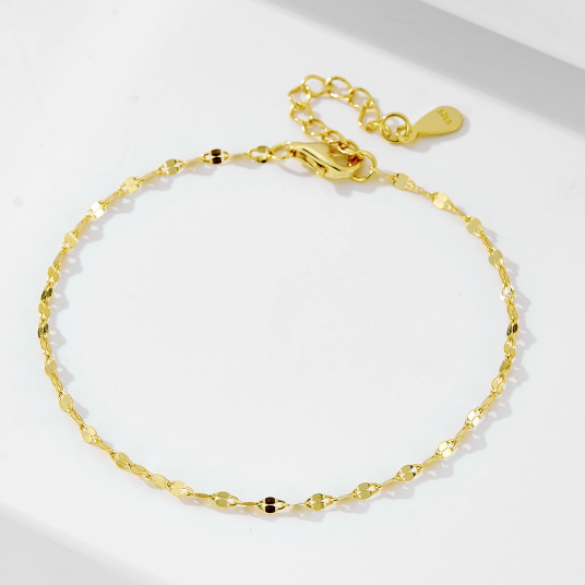 Bracelet Cabaret en métal doré, chaîne à maillons, perles noires et fermoir