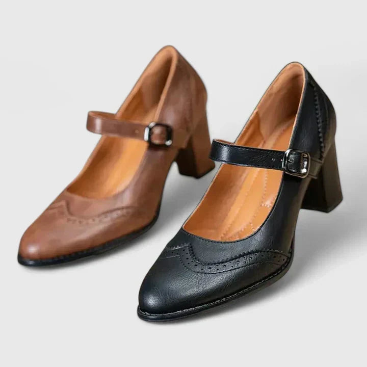 Paire de chaussures bébé à talon marron et noir, brides à boucles et talons carrés