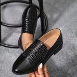 Mocassins vernis noirs à bout pointu et empiècement effet croco