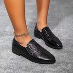 Mocassins vernis noirs à empiècement effet croco et bout pointu
