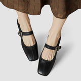 Chaussures à talon pour bébé noires, bride à boucle et petit talon carré