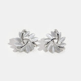 Élodie – Boucles d’oreilles en argent a forma di fiore.