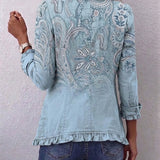 Veste bleu ciel à motifs paisley, fermeture boutonnée et volant en bas