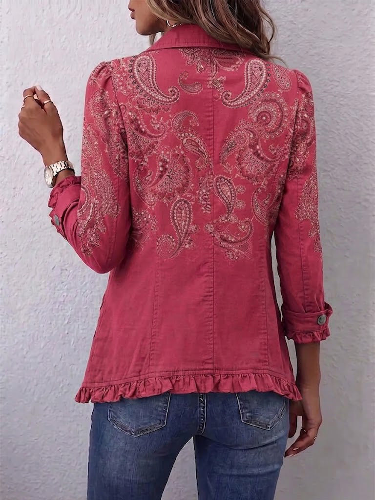 Veste rose à motif paisley, boutons au dos, bas et manches à volants