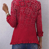 Veste rouge à motifs paisley dégradés, col montant et volants sur l’ourlet