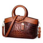 Sac à main classique effet croco marron foncé, poignées rigides et bandoulière