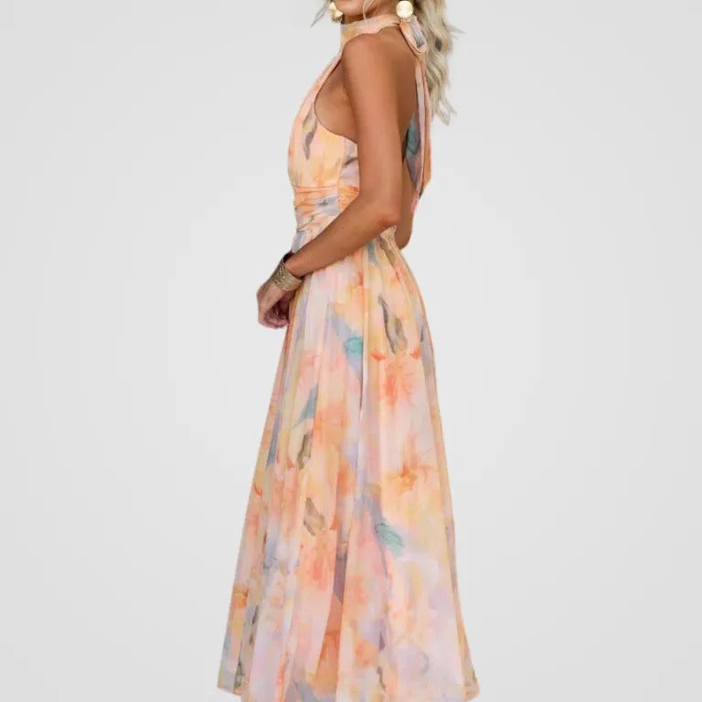 Robe midi à col halter, imprimé pastel rose, bleu et orange, jupe évasée, sans manches.