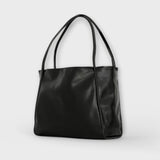 Sac Néréa Blair noir à anses, cuir lisse brillant, forme cabas avec devant plat